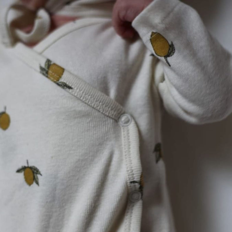 Strampler “New Born Lemon”