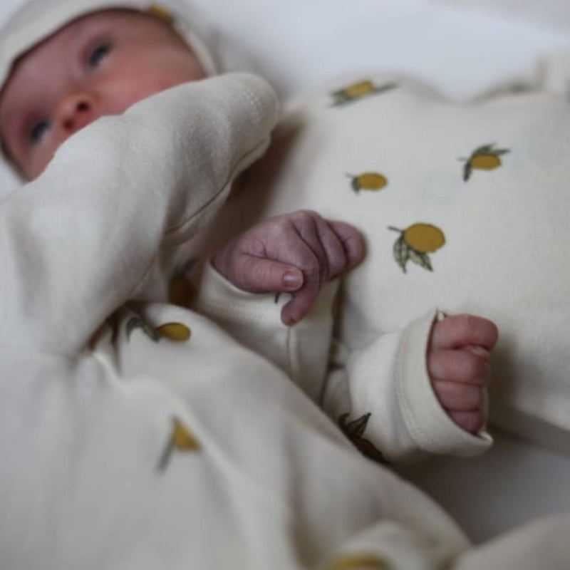 Strampler “New Born Lemon”